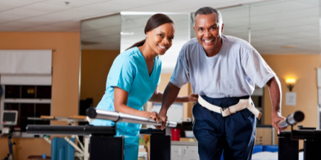 Therapist assisting patient with balance exercises