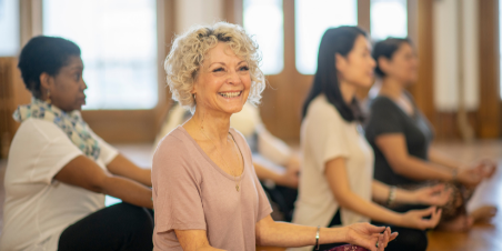 Diverse class of yoga students